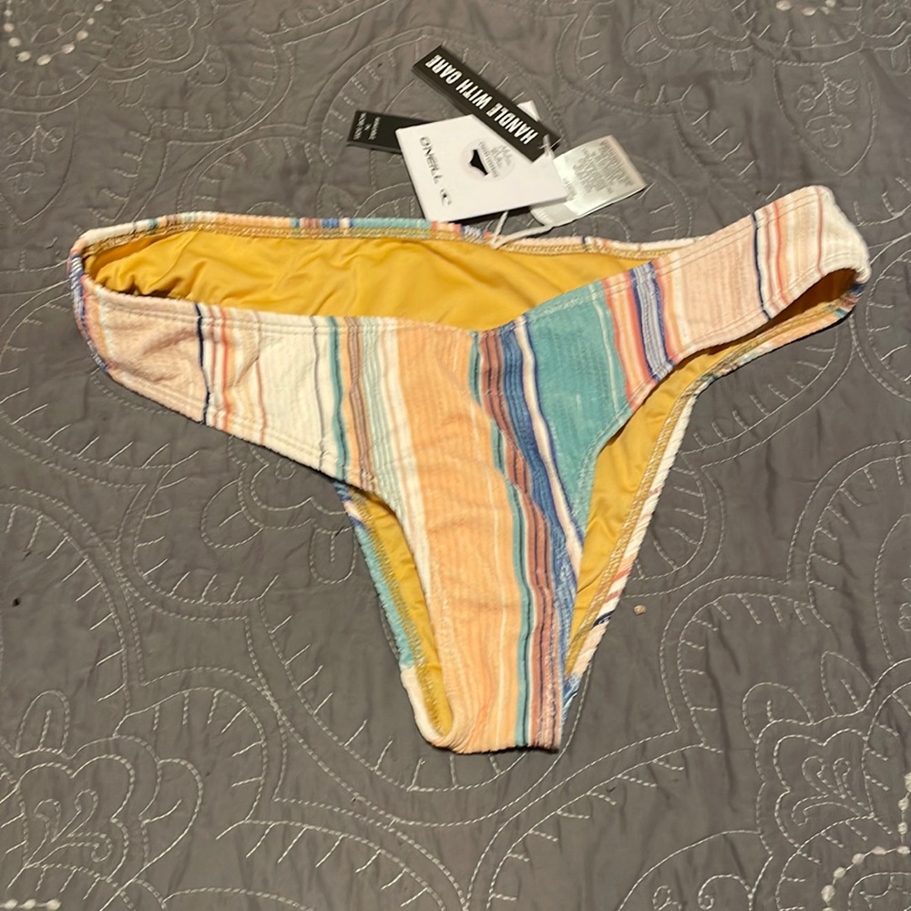 Oneill cheeky swim bottoms with a bonus ribbed brown shein crop tank.